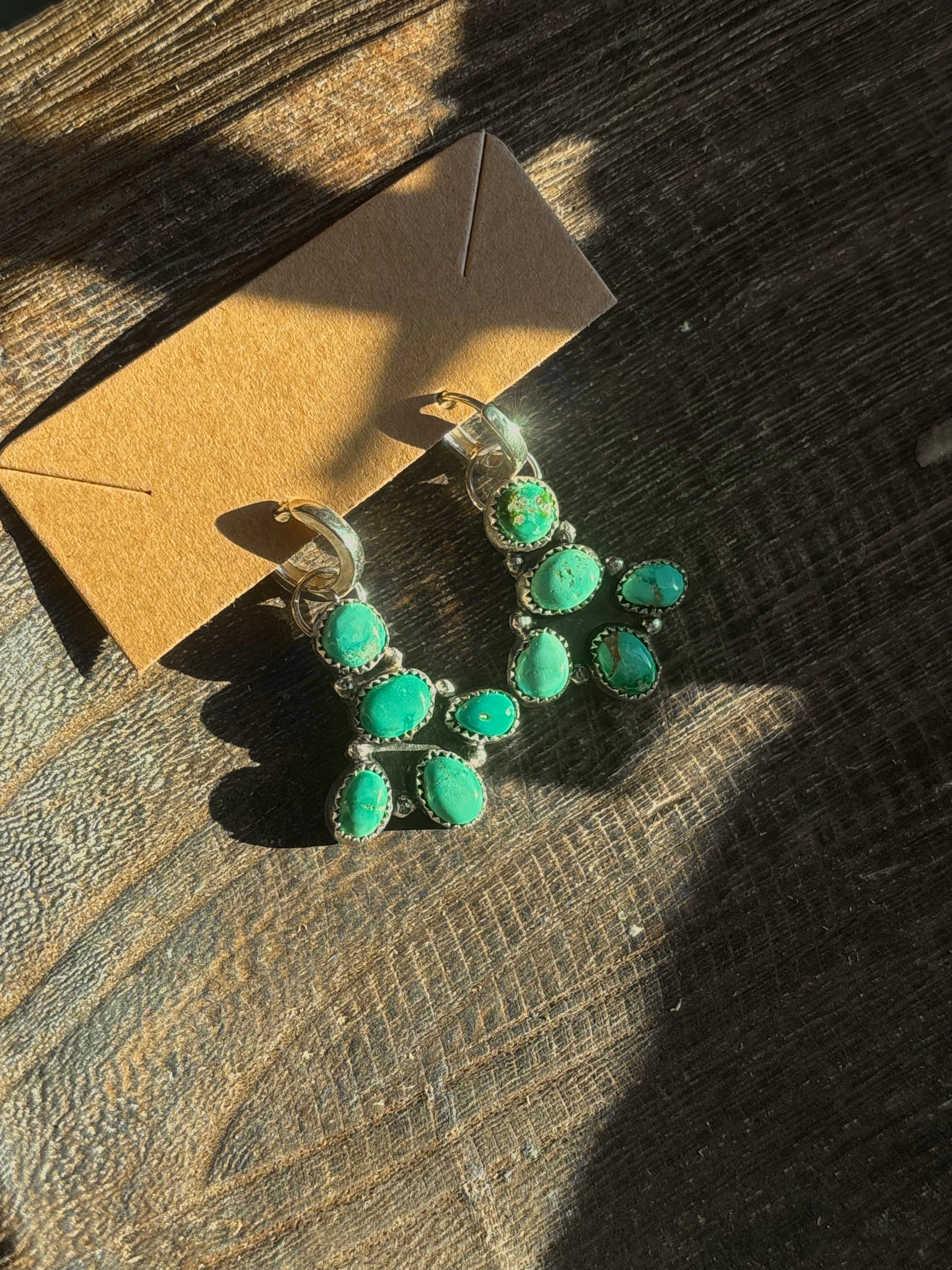 Emerald Valley Huggie Earrings